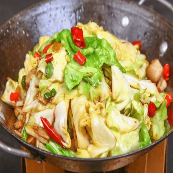 CAVOLO CAPUCCIO SALTATO IN PADELLA DI FUOCO